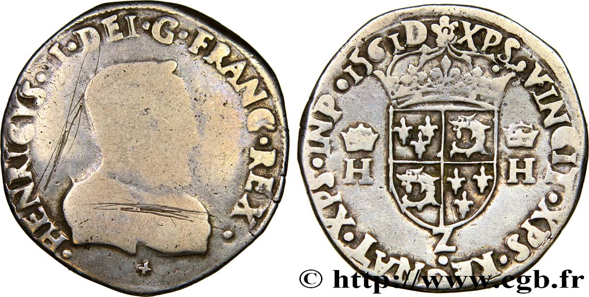 CHARLES IX. COINAGE AT THE NAME OF HENRY II Teston du Dauphiné à la tête nue 1561 Grenoble MB/BB