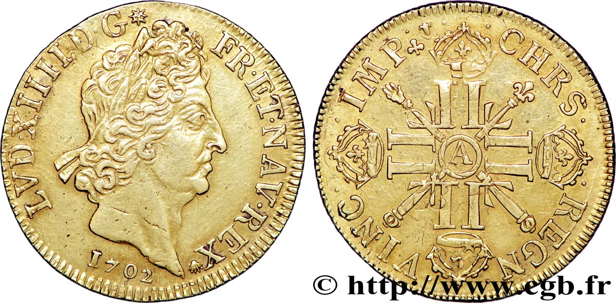 LOUIS XIV  THE SUN KING  Double louis d or aux huit L et aux insignes 1702 Paris MBC/MBC+