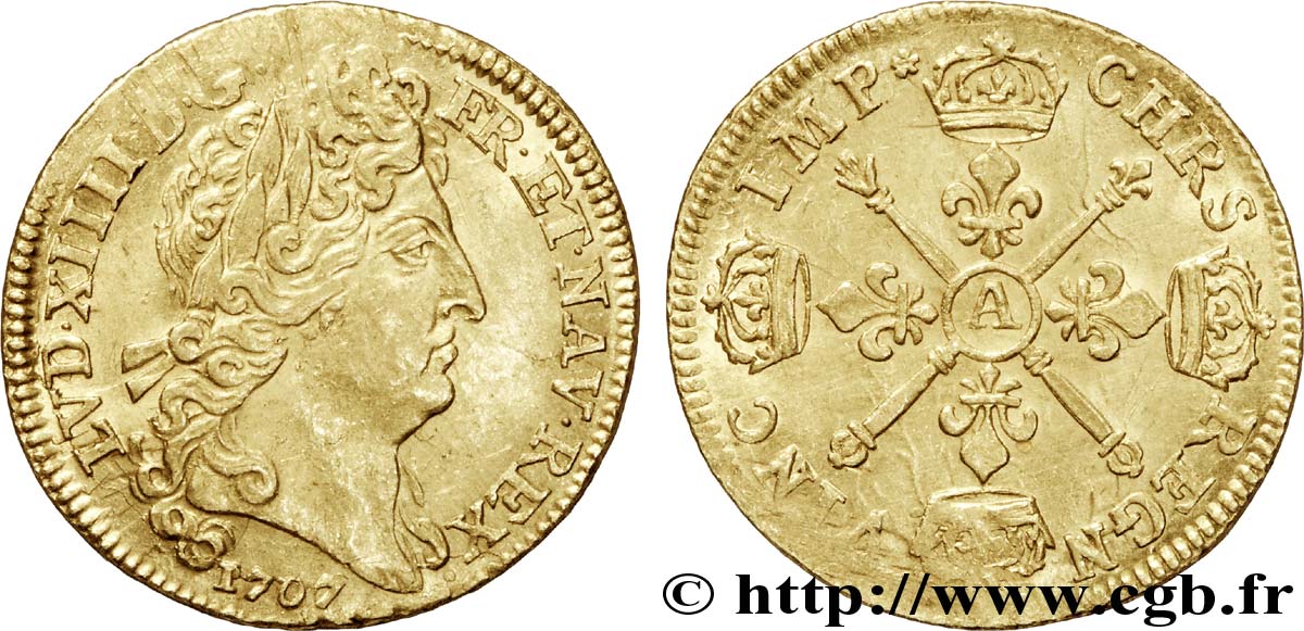 LOUIS XIV LE GRAND OU LE ROI SOLEIL Louis d or aux insignes, portrait aux cheveux longs 1707 Paris TTB+